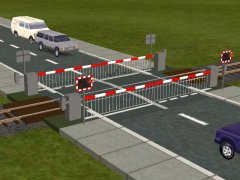 UK Skirted Full Barrier single track level crossing. This style is appropriate for the 1970's up to the current day. Used where traffic (either road or rail) is too heavy for an automatic half-barrier crossing.
